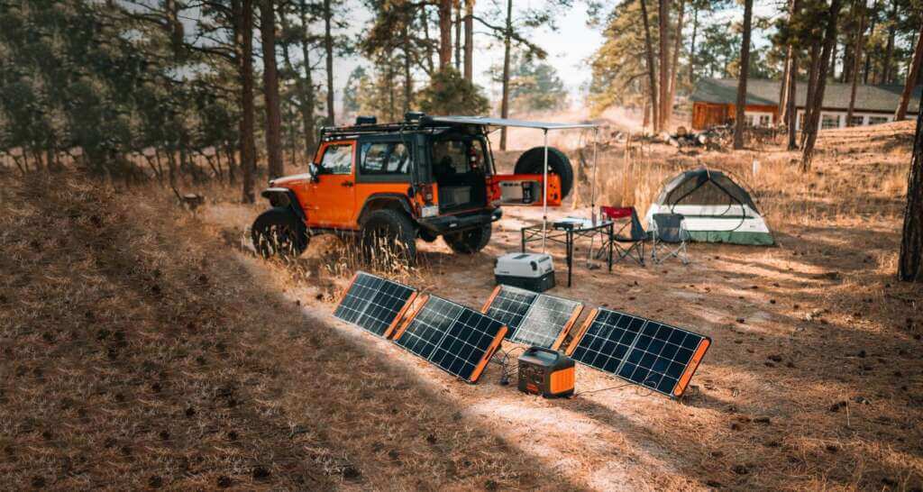Jackery Power Station Charging Vis Solar Panel In Forest