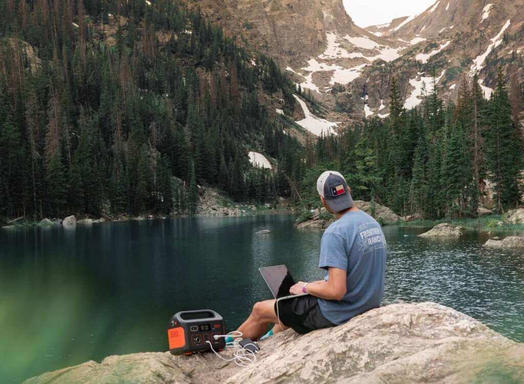 Power Station Charging Macbook During Hiking 1